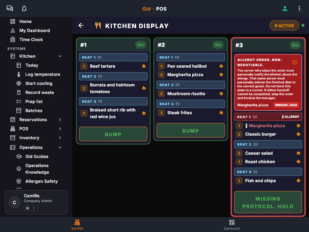 The Gid kitchen display with an allergy order flagged in red.